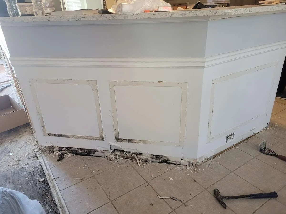Water damage and mold on kitchen during Storm Damage Restoration in Center